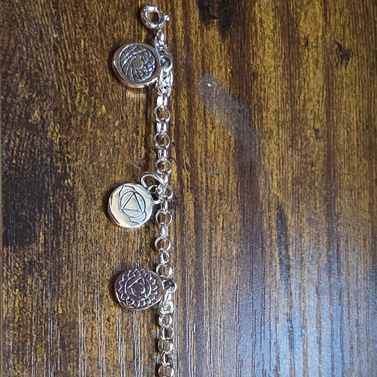 925 Silver Seven-Symbol Chakra Charm Bracelet – 7.5 Inches